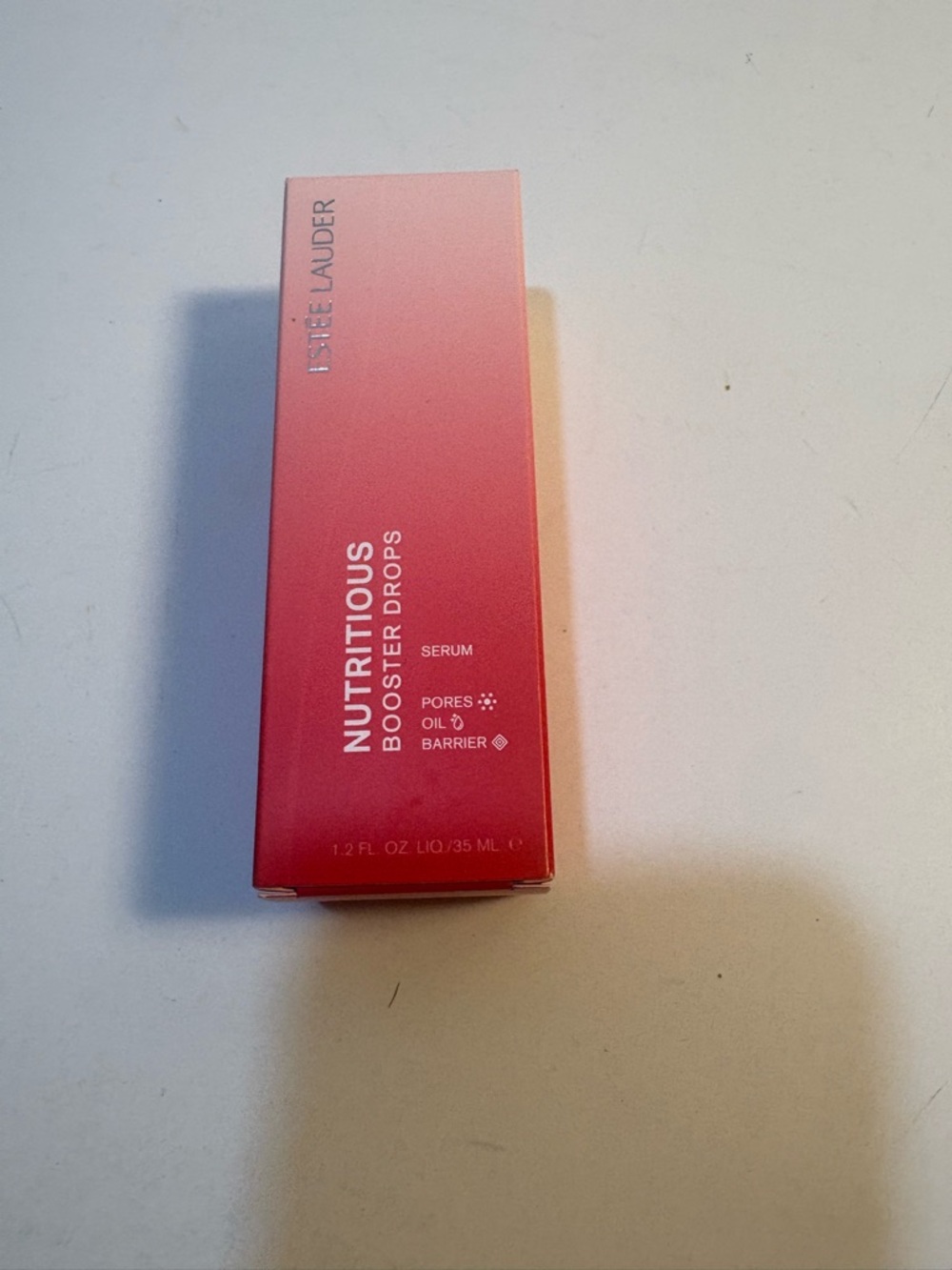 Estee Lauder Nutritious Booster Drops - Pink to Coral Gradient Packaging